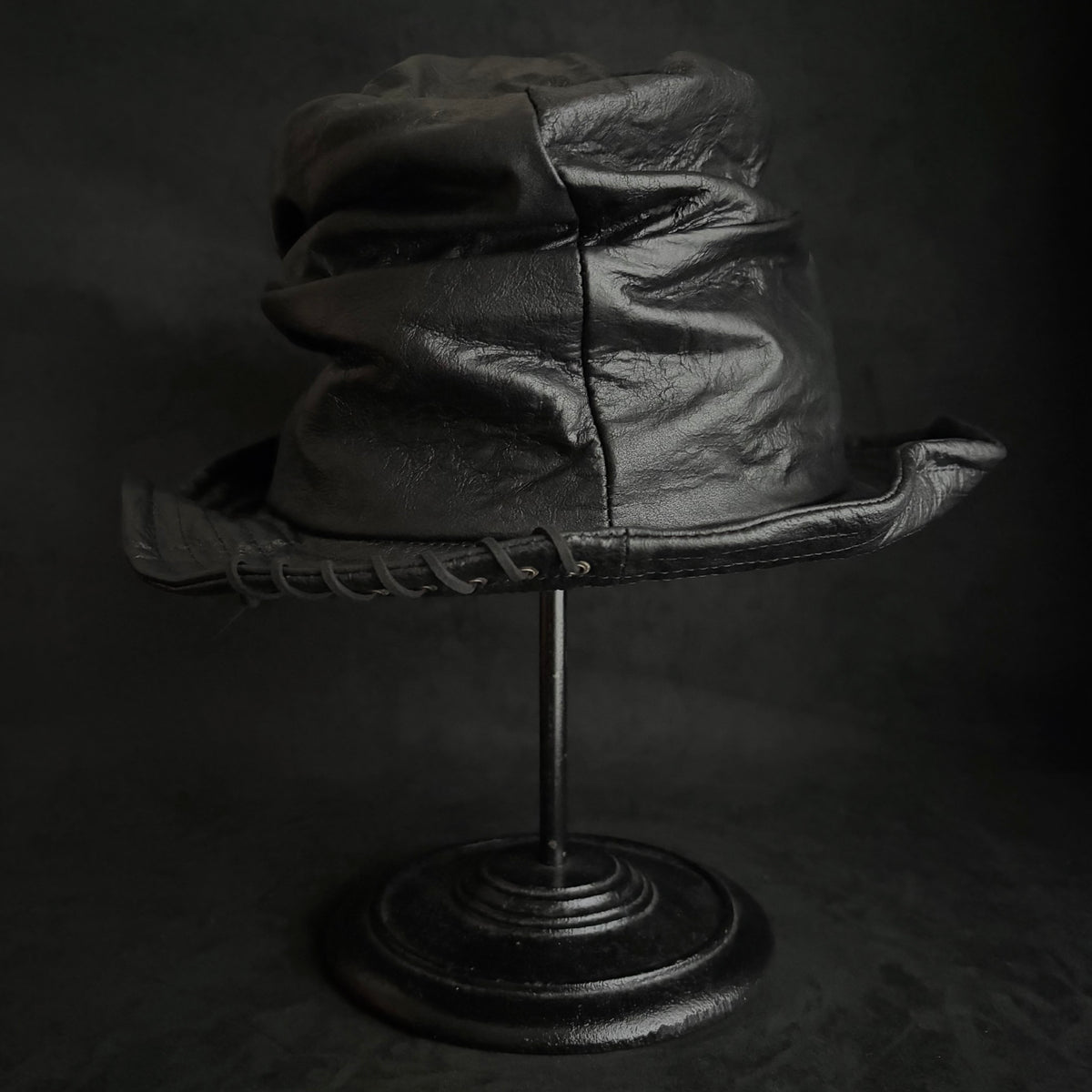 Dense black leather turn bucket hat