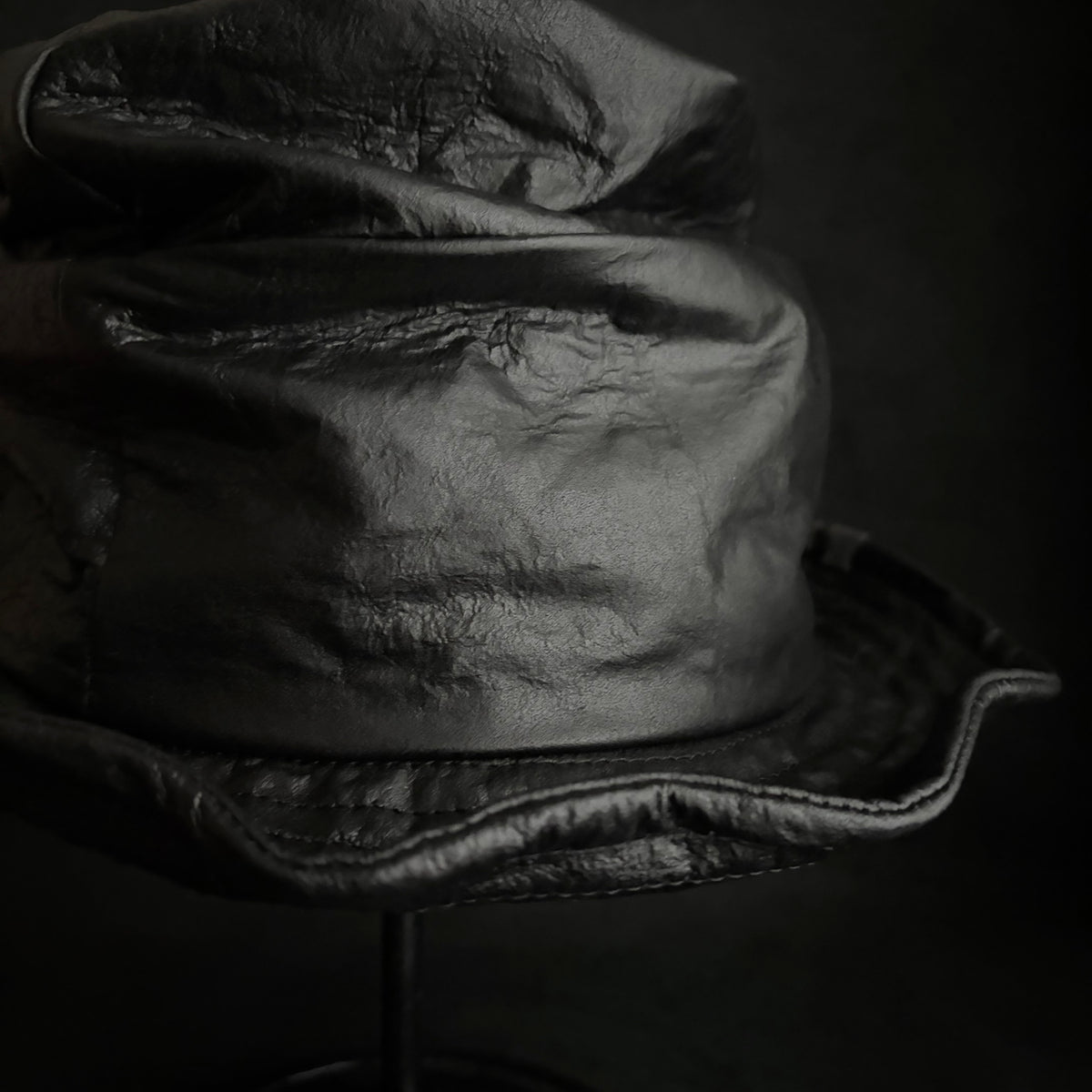 Dense black leather turn bucket hat