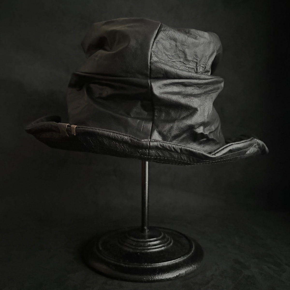 Dense black leather turn bucket hat