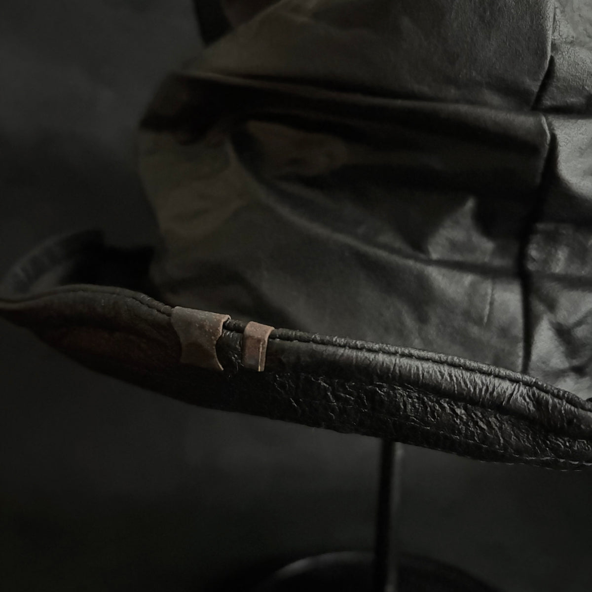 Dense black leather turn bucket hat