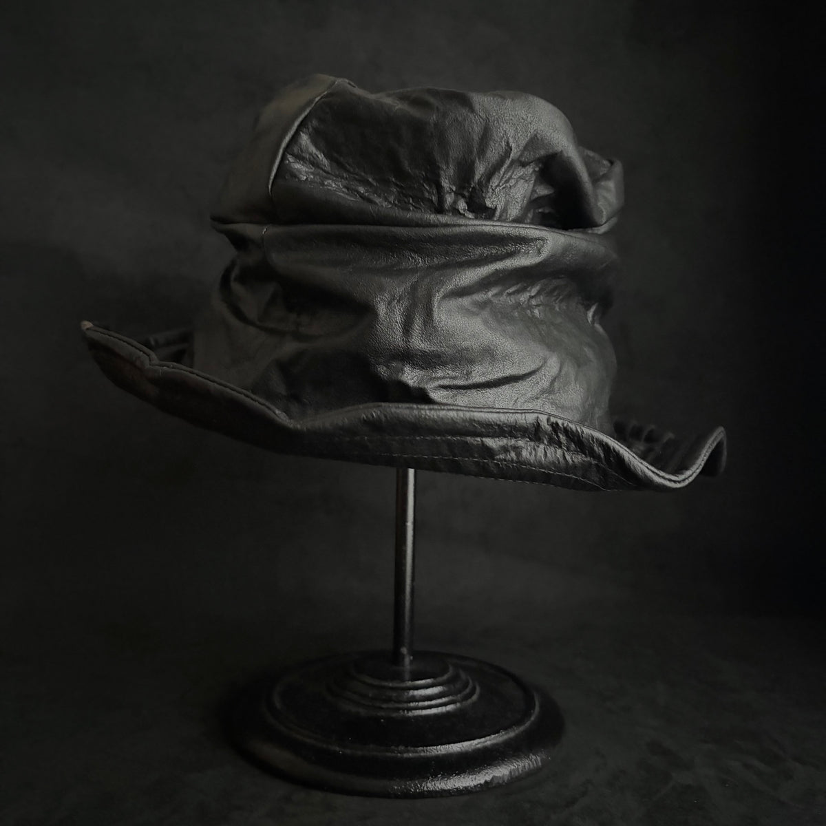 Dense black leather turn bucket hat