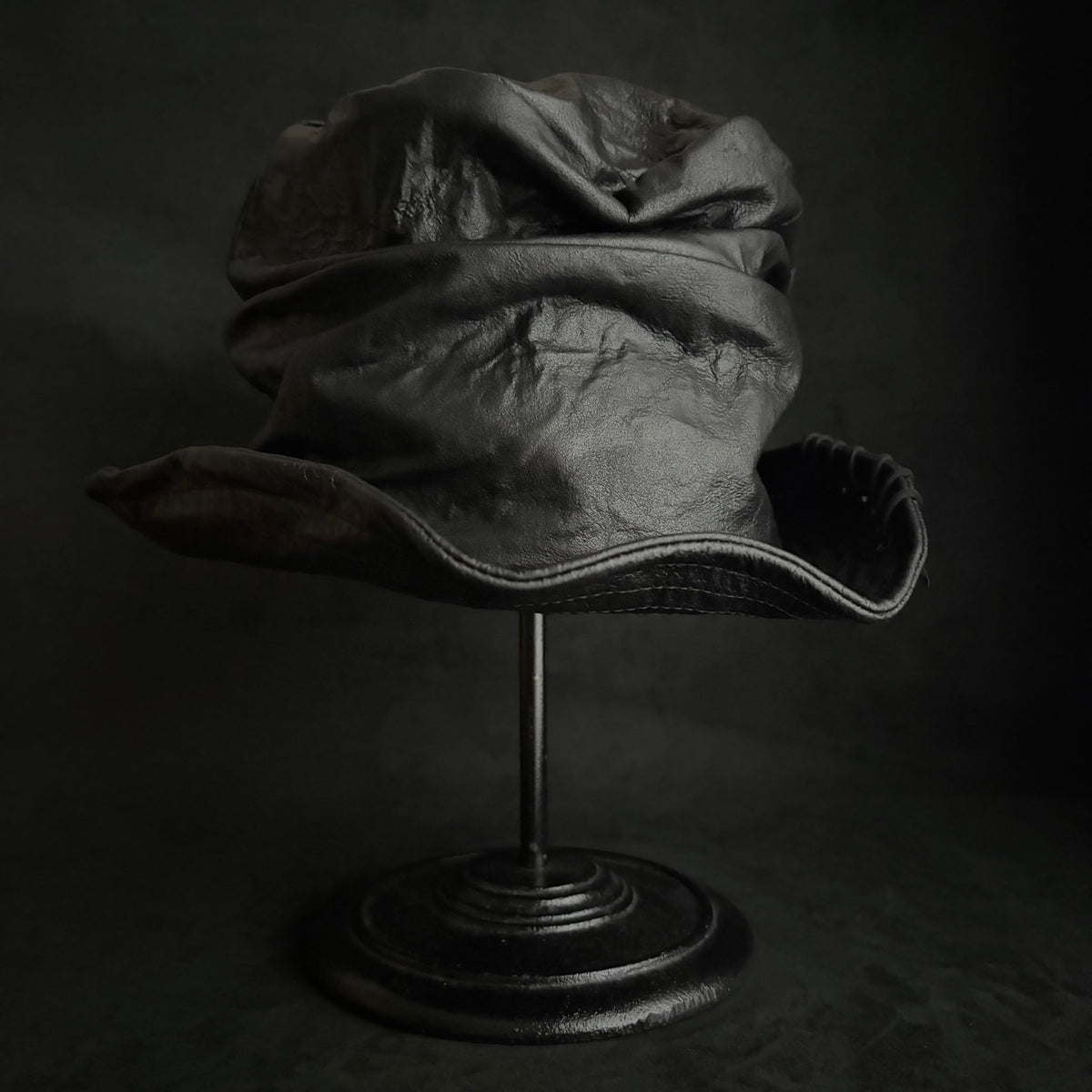 Dense black leather turn bucket hat