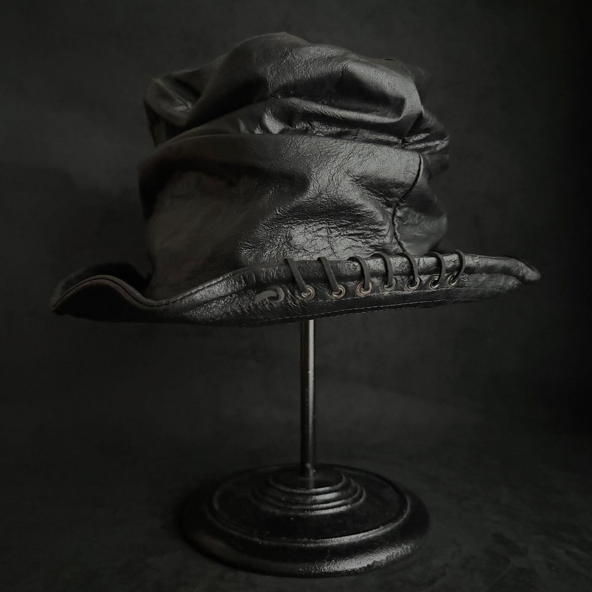 Dense black leather turn bucket hat