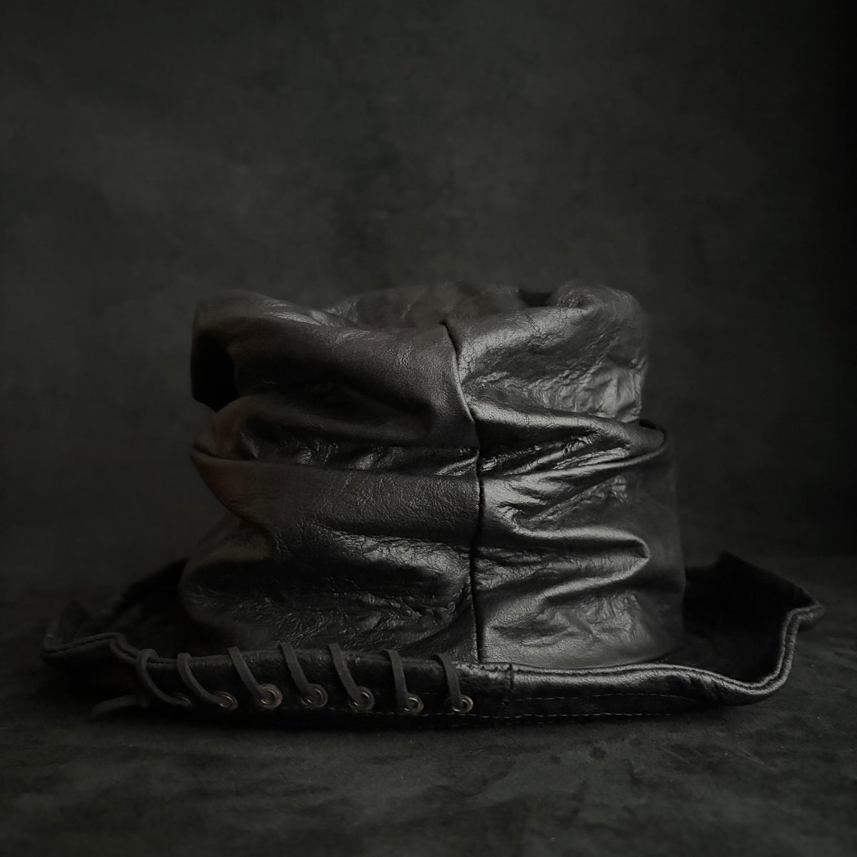 Dense black leather turn bucket hat