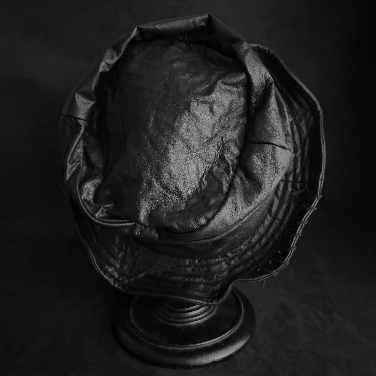 Dense black leather turn bucket hat