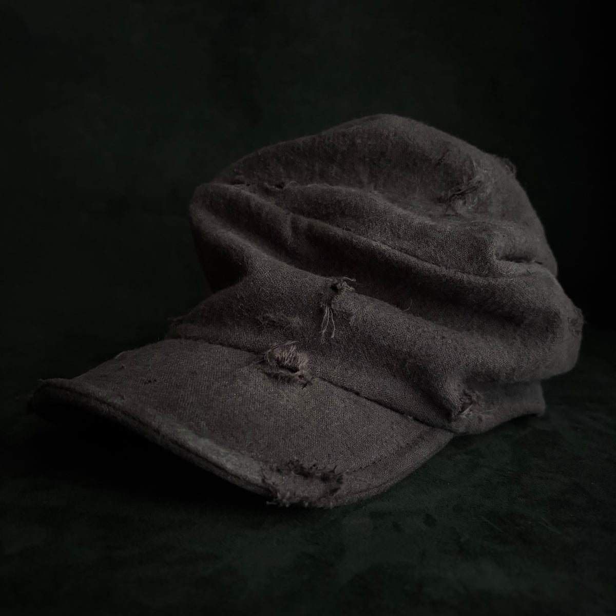 Formerly damage brown linen turn cap