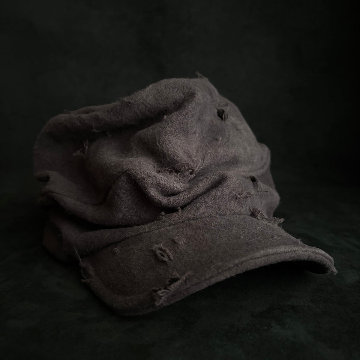 Formerly damage brown linen turn cap