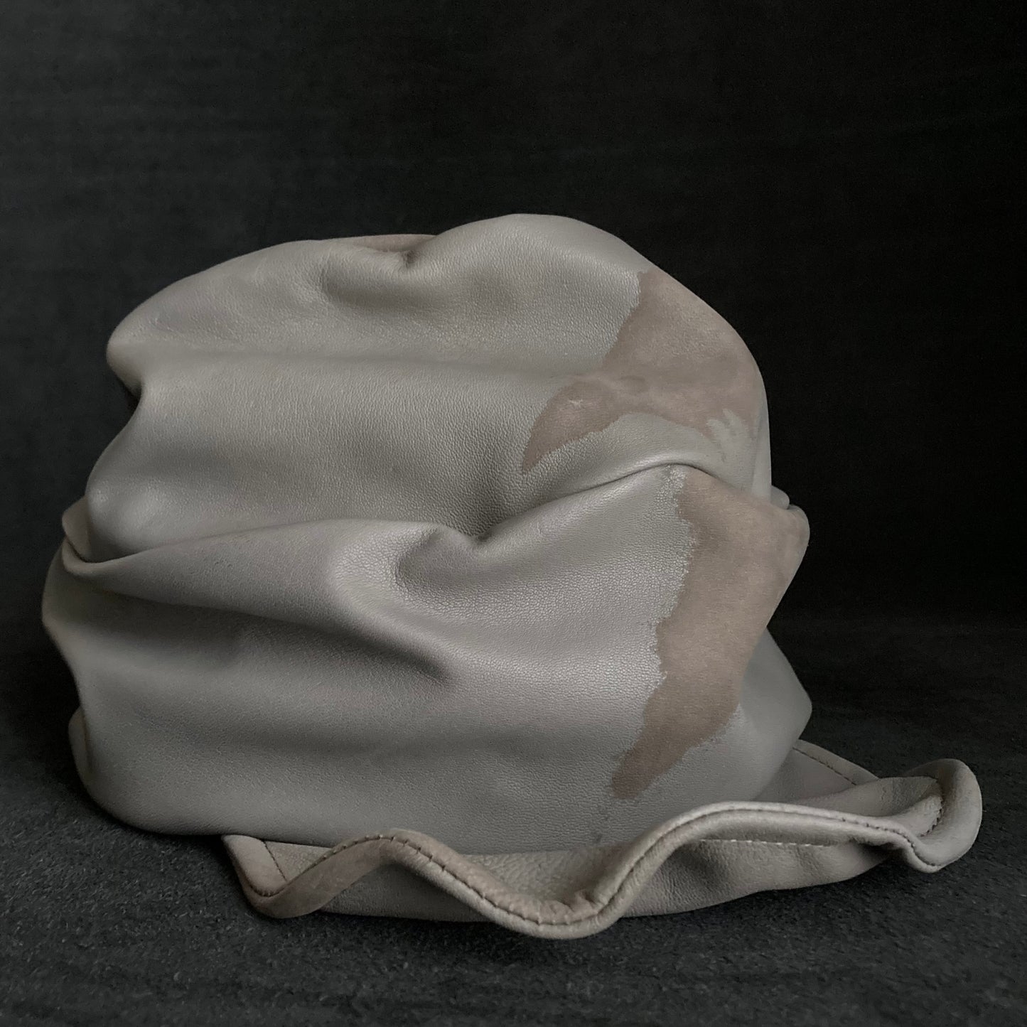 Marks of scratches light gray leather turn cap