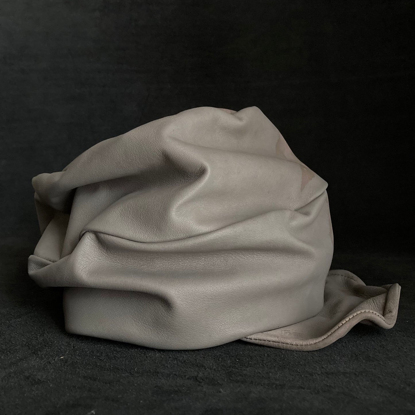 Marks of scratches light gray leather turn cap