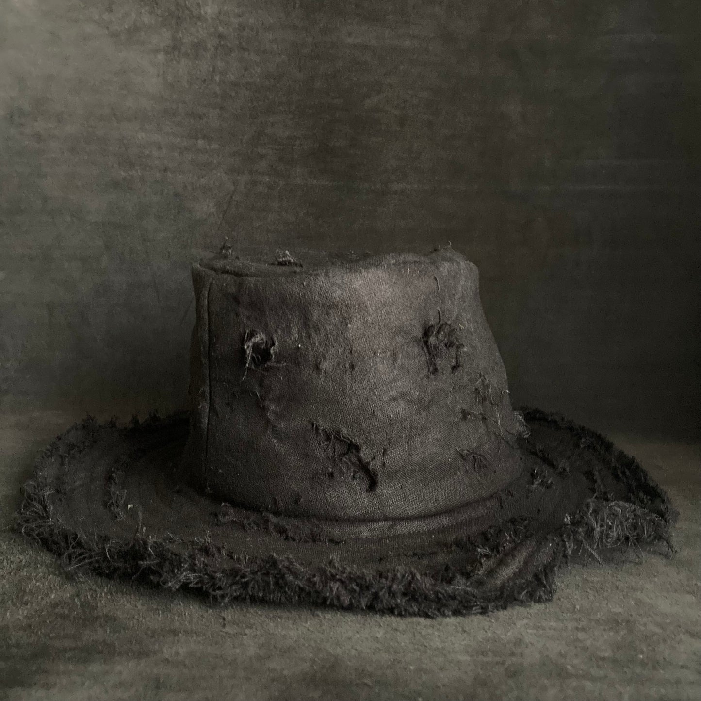 Black linen damage  fedora hat