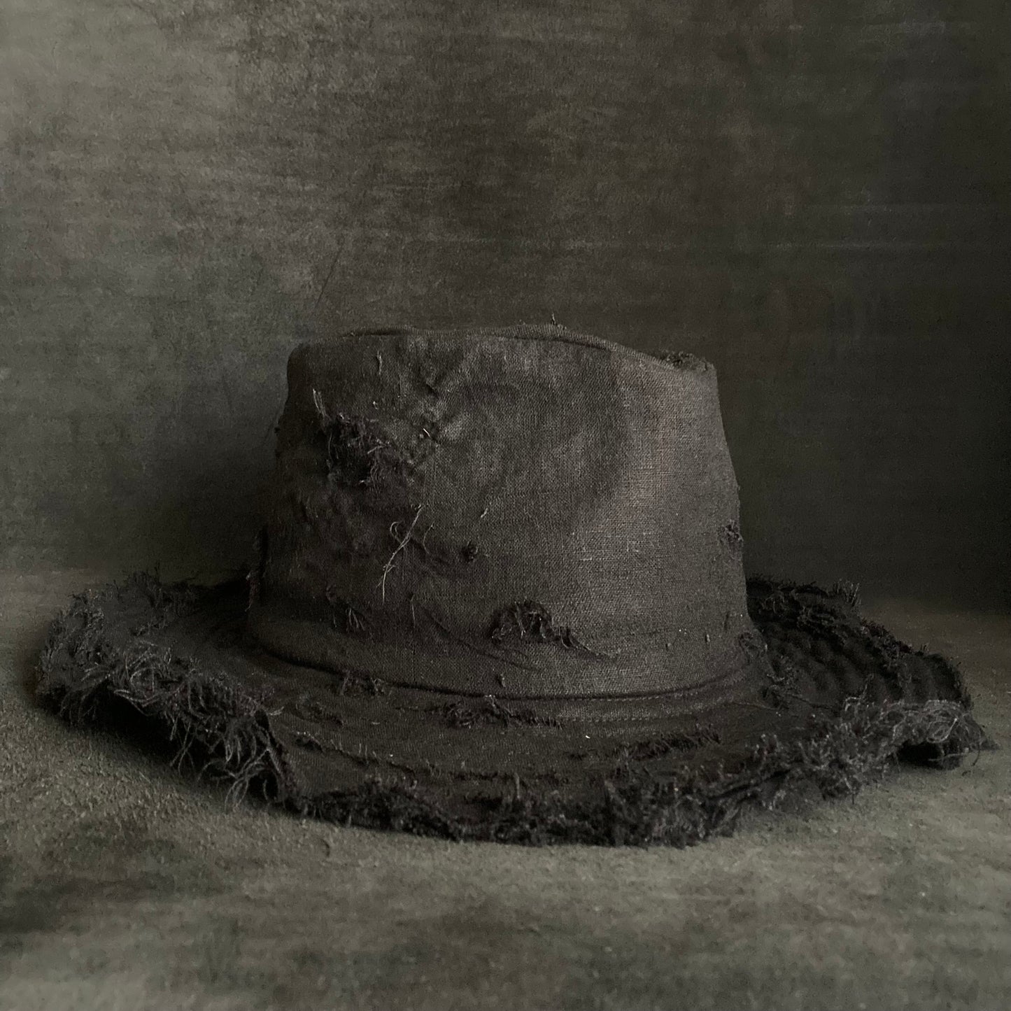 Black linen damage  fedora hat