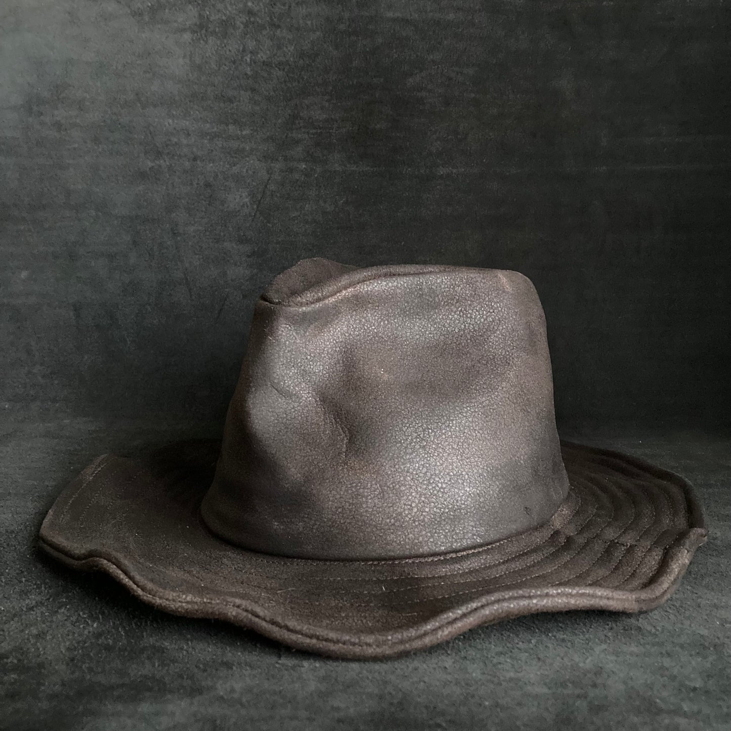 Dark brown stone grain leather fedora hat