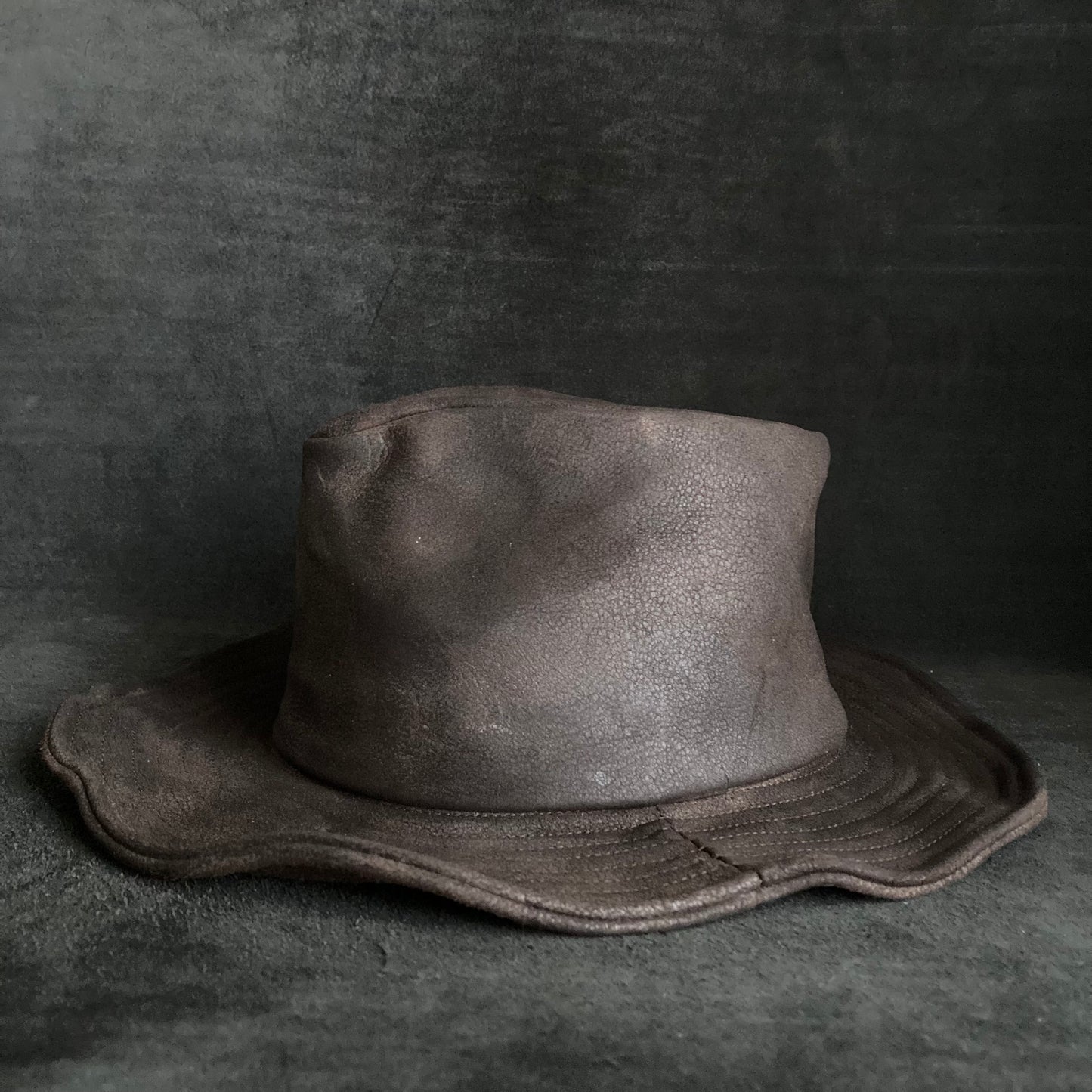 Dark brown stone grain leather fedora hat