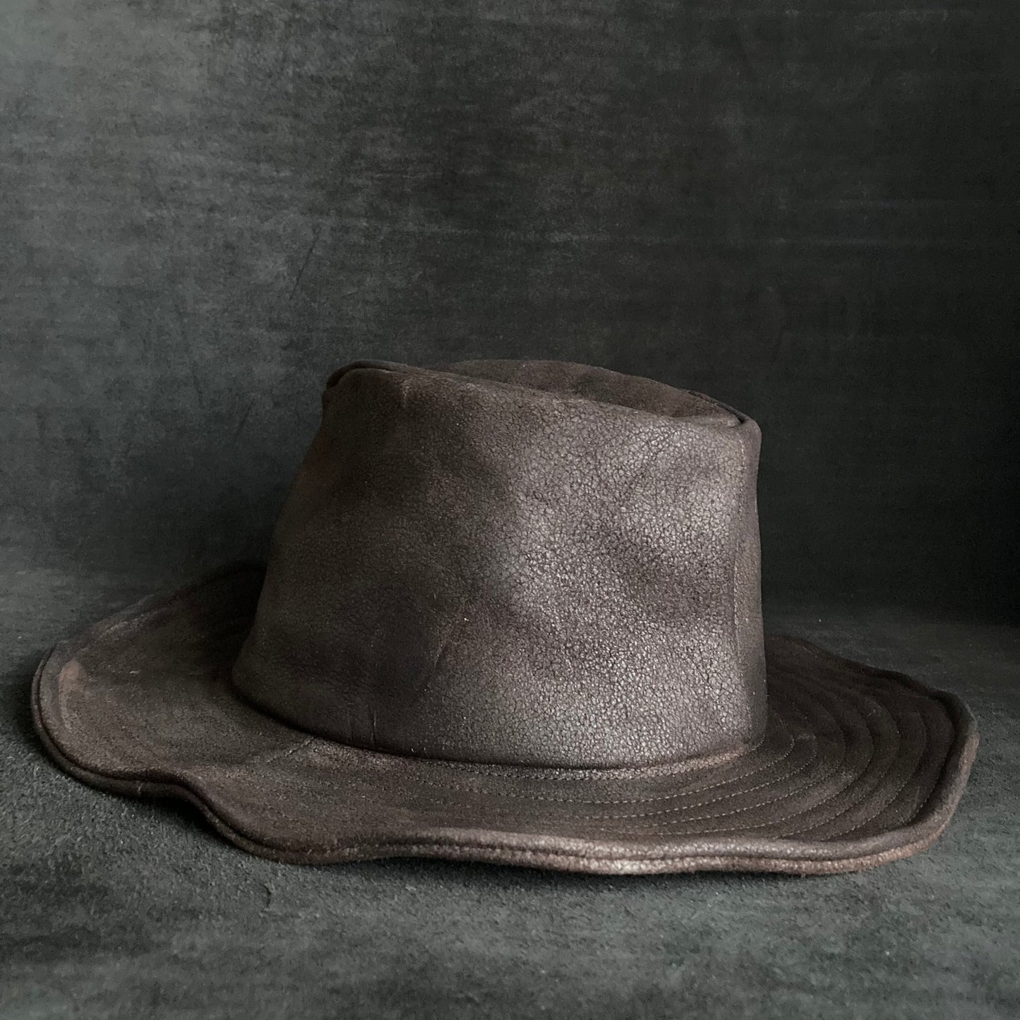 Dark brown stone grain leather fedora hat