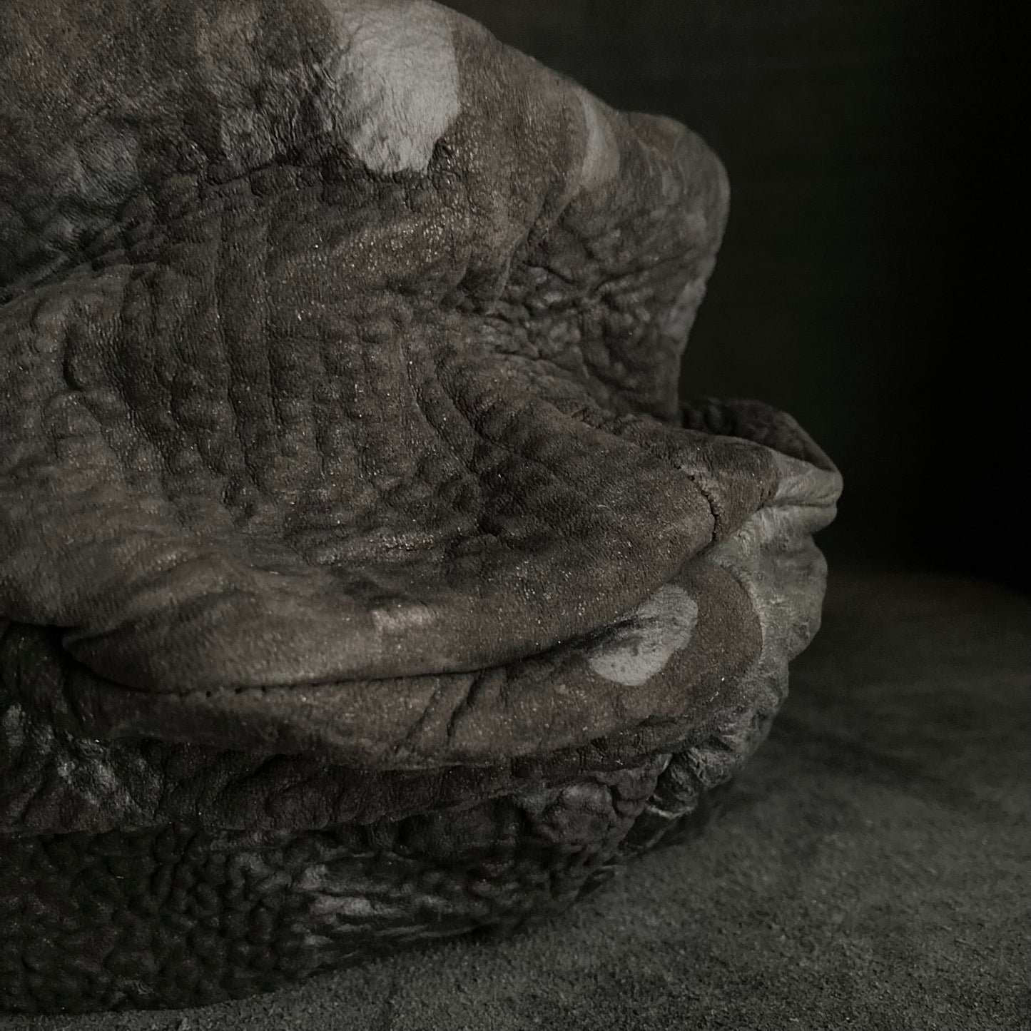 Grain sheepskin leather turn cap