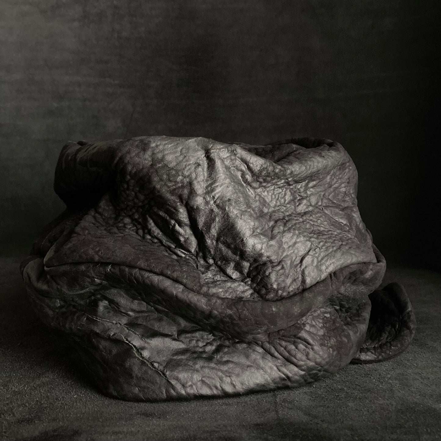 Grain sheepskin leather turn cap