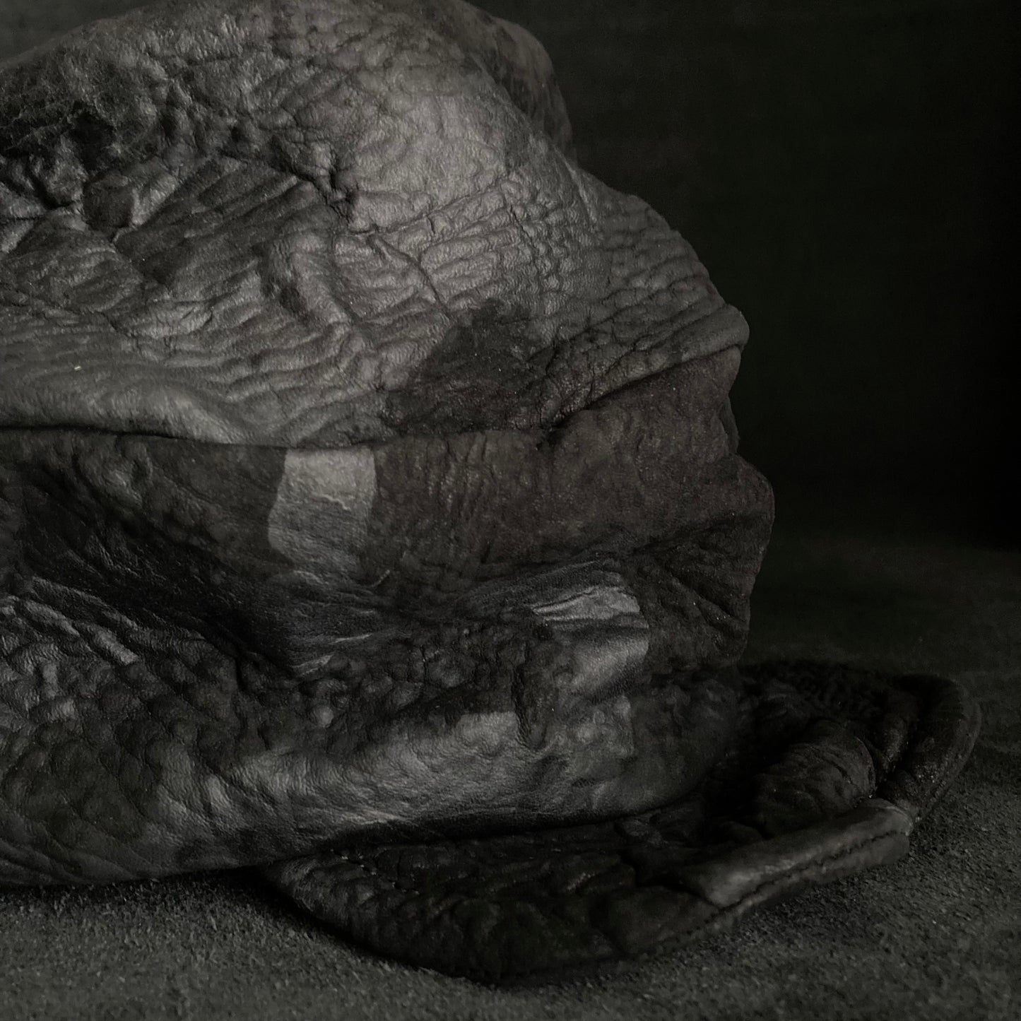 Grain sheepskin leather turn cap