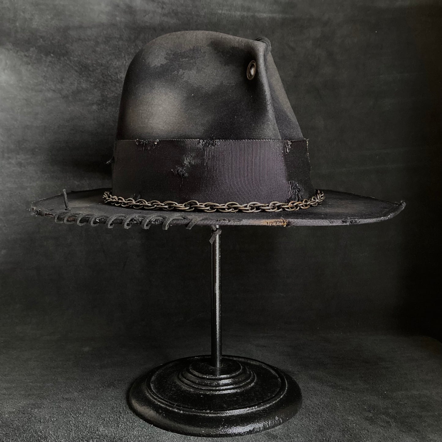 Eyelet burned hi-fedora hat