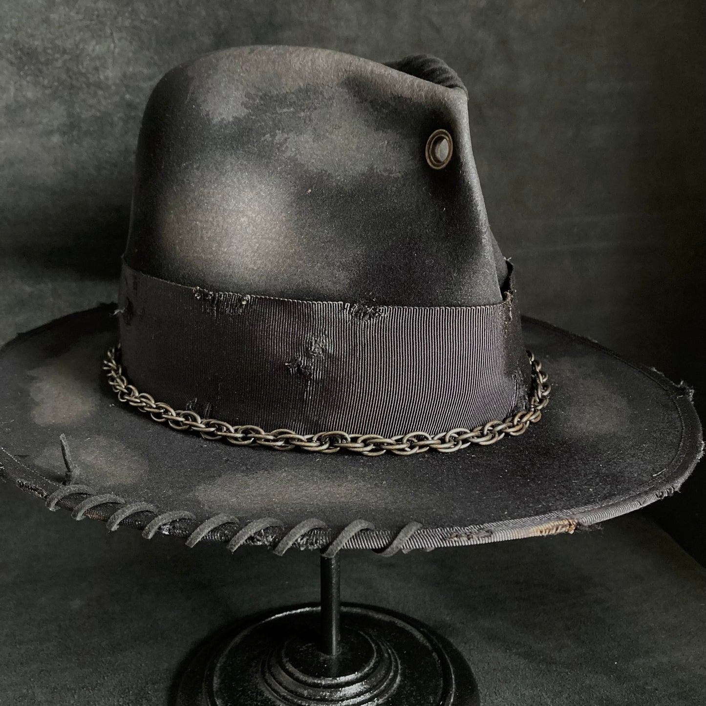 Eyelet burned hi-fedora hat