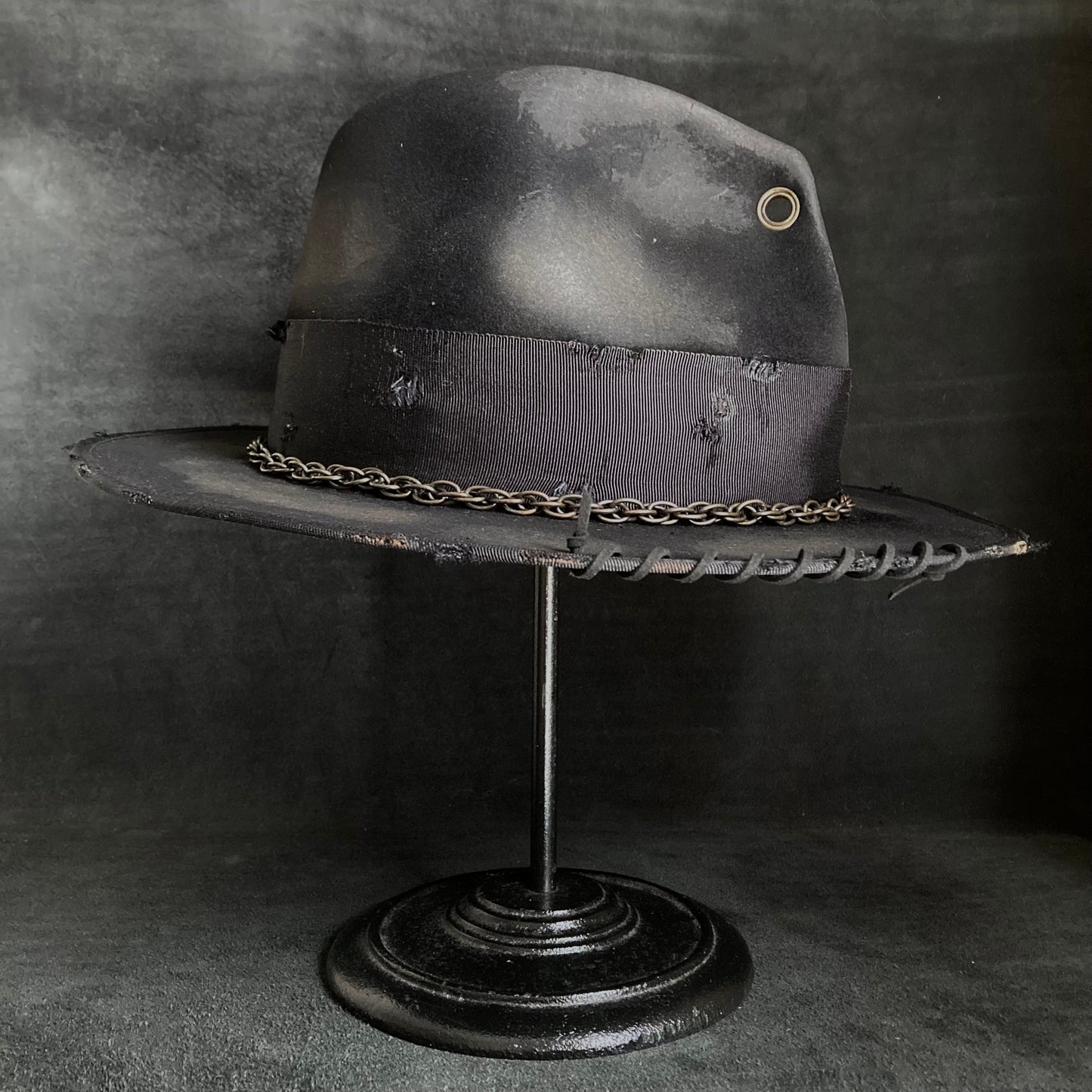 Eyelet burned hi-fedora hat