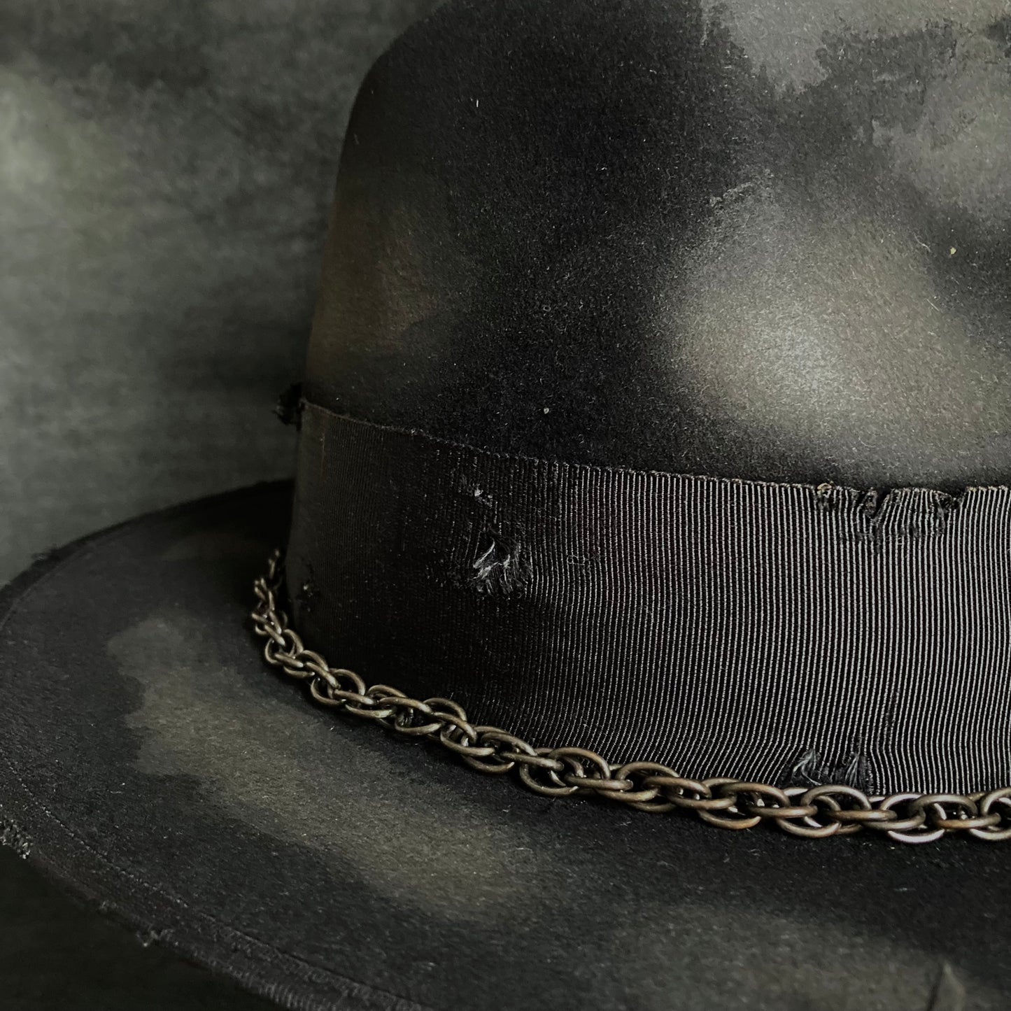 Eyelet burned hi-fedora hat