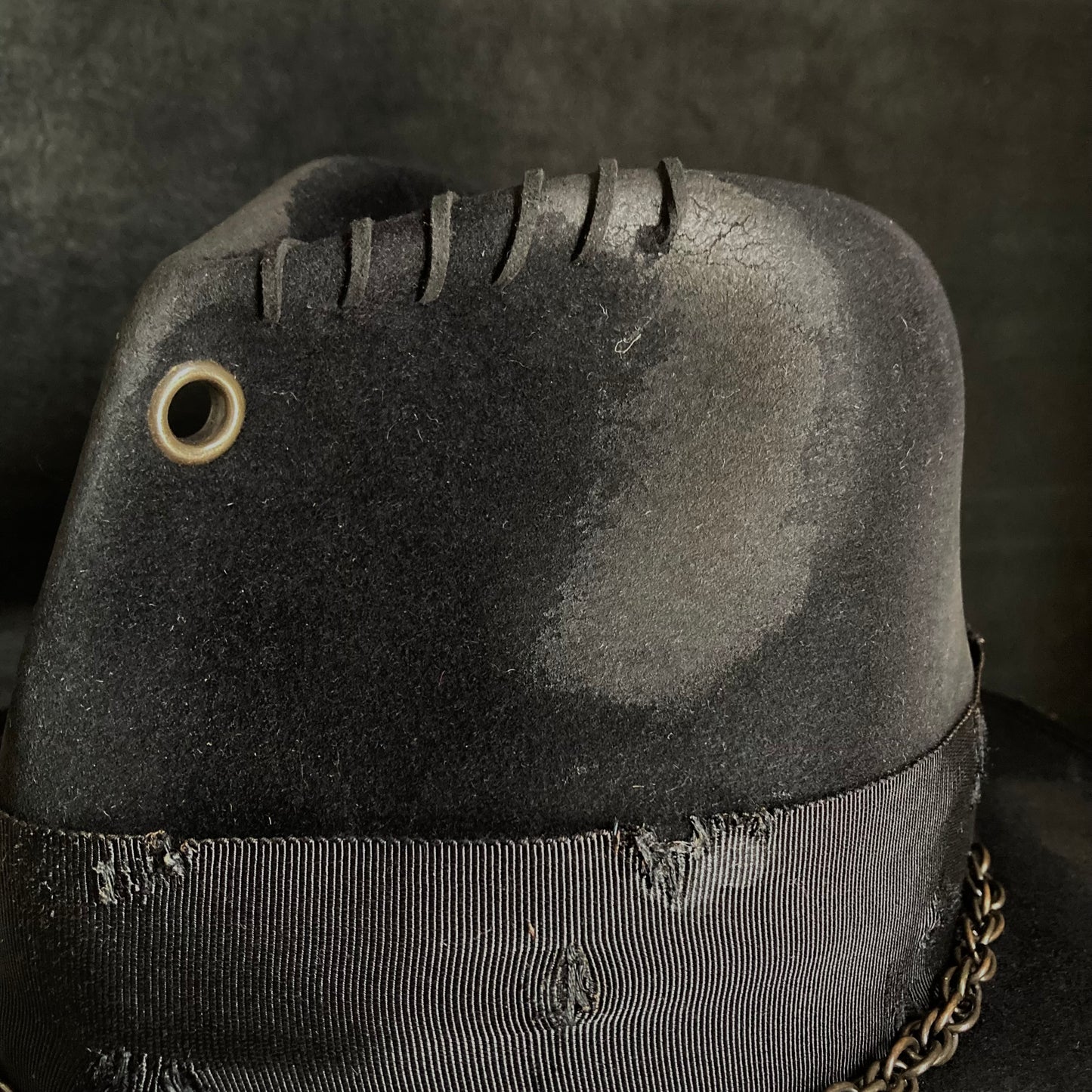 Eyelet burned hi-fedora hat