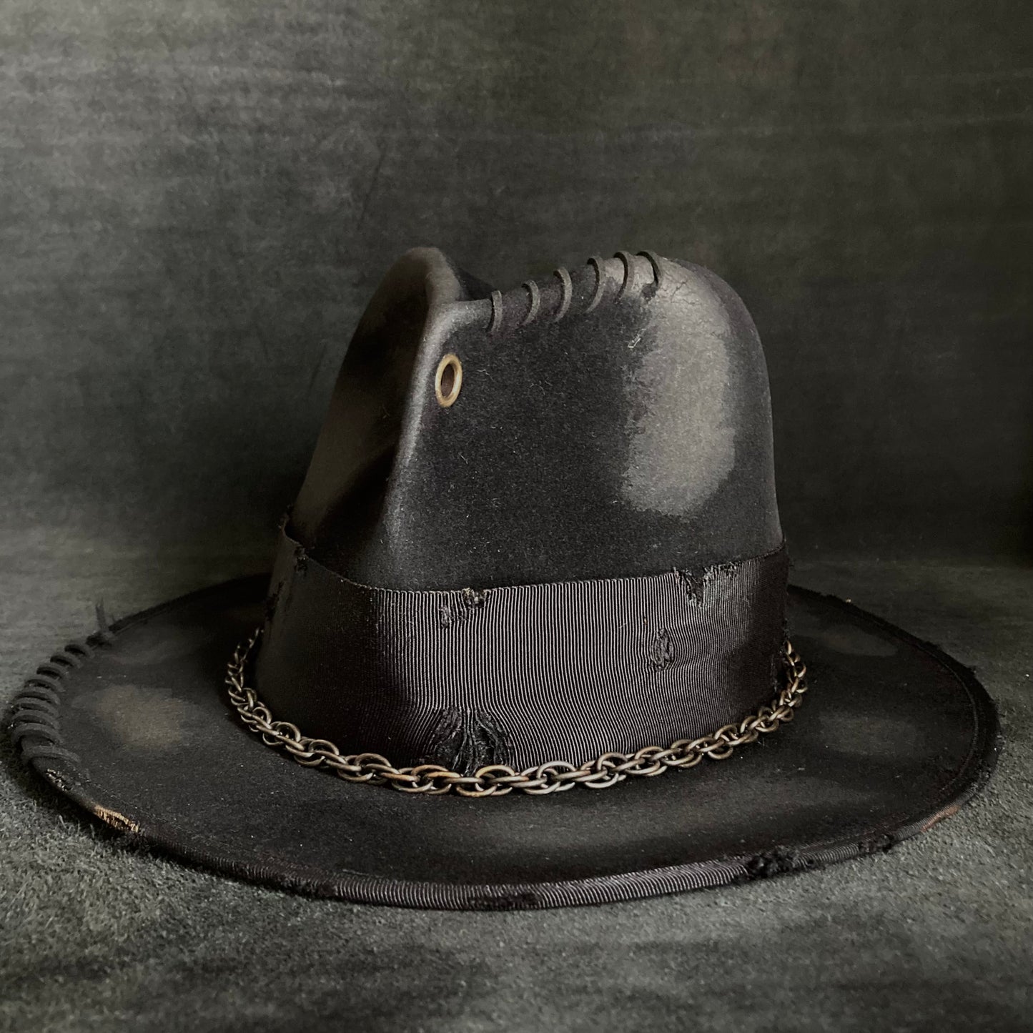 Eyelet burned hi-fedora hat