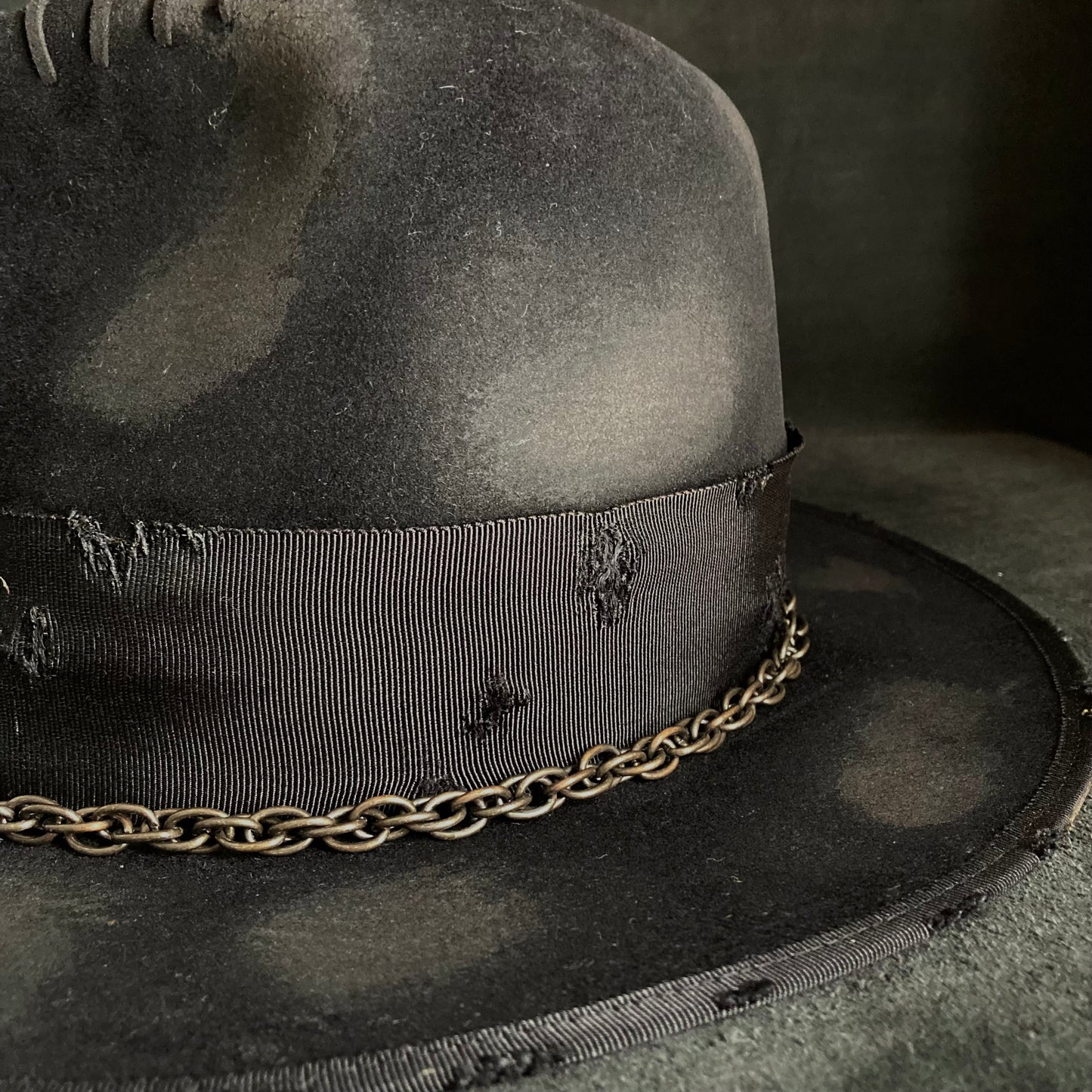 Eyelet burned hi-fedora hat