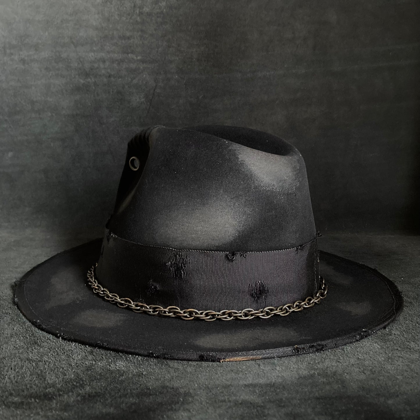 Eyelet burned hi-fedora hat