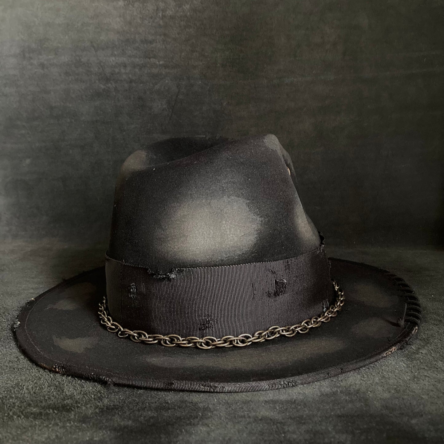 Eyelet burned hi-fedora hat