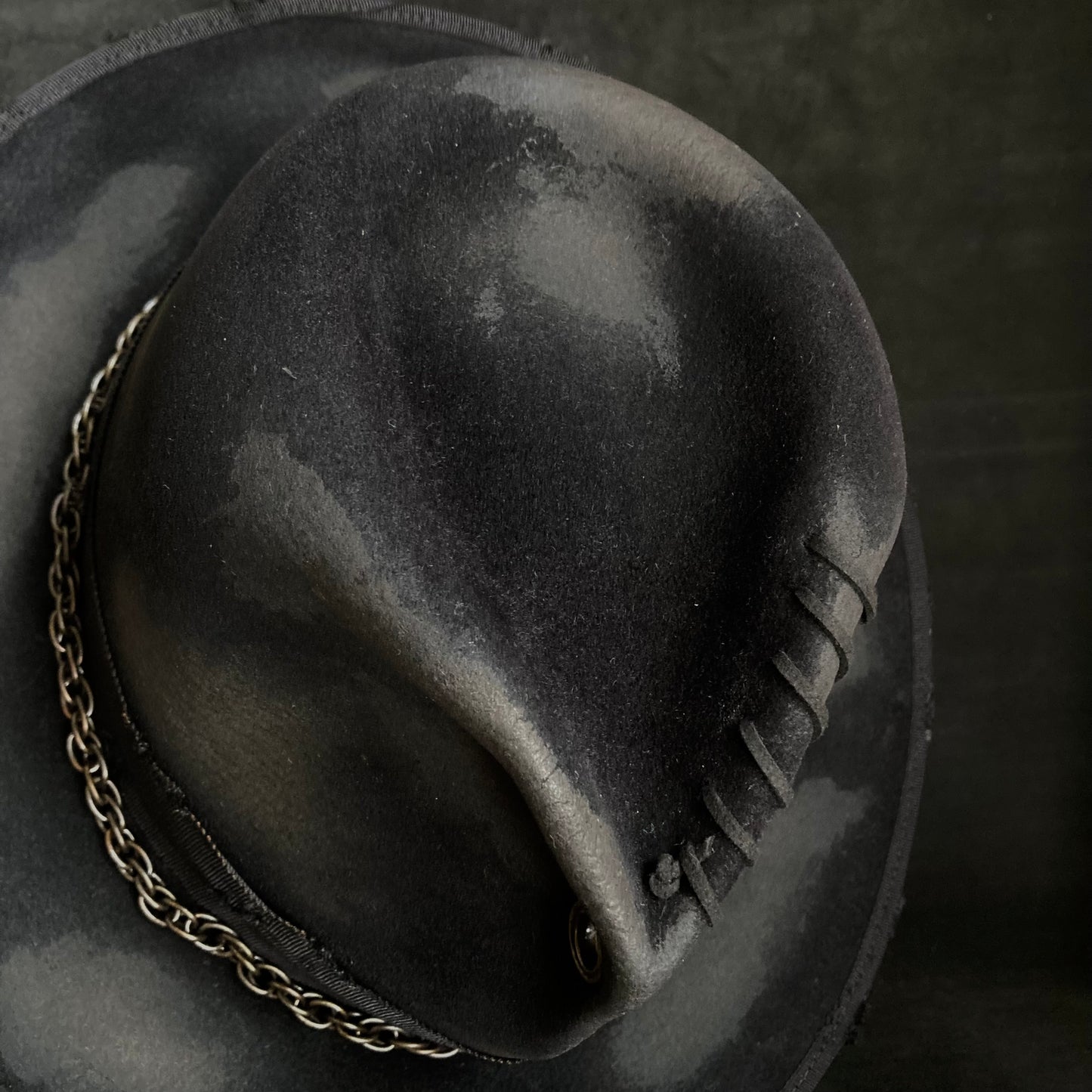 Eyelet burned hi-fedora hat