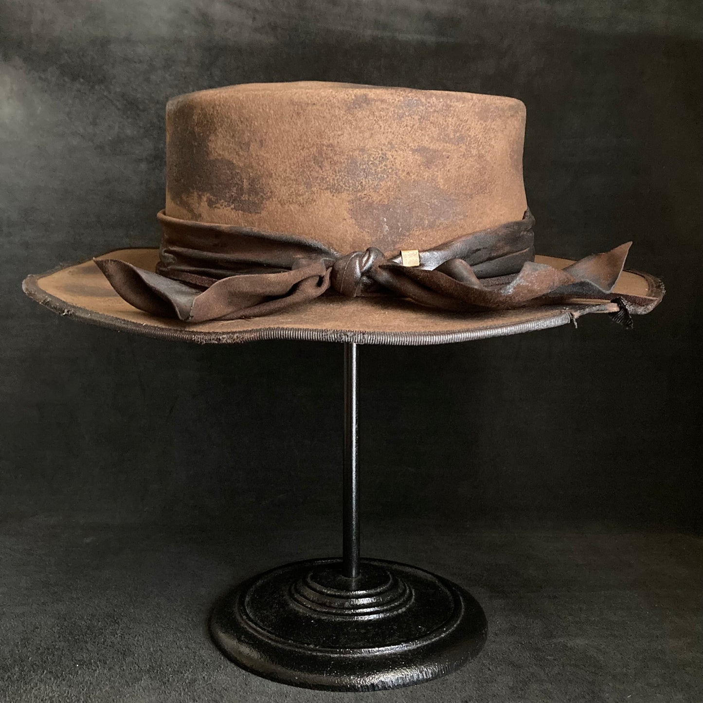 Burned dark camel flat hat