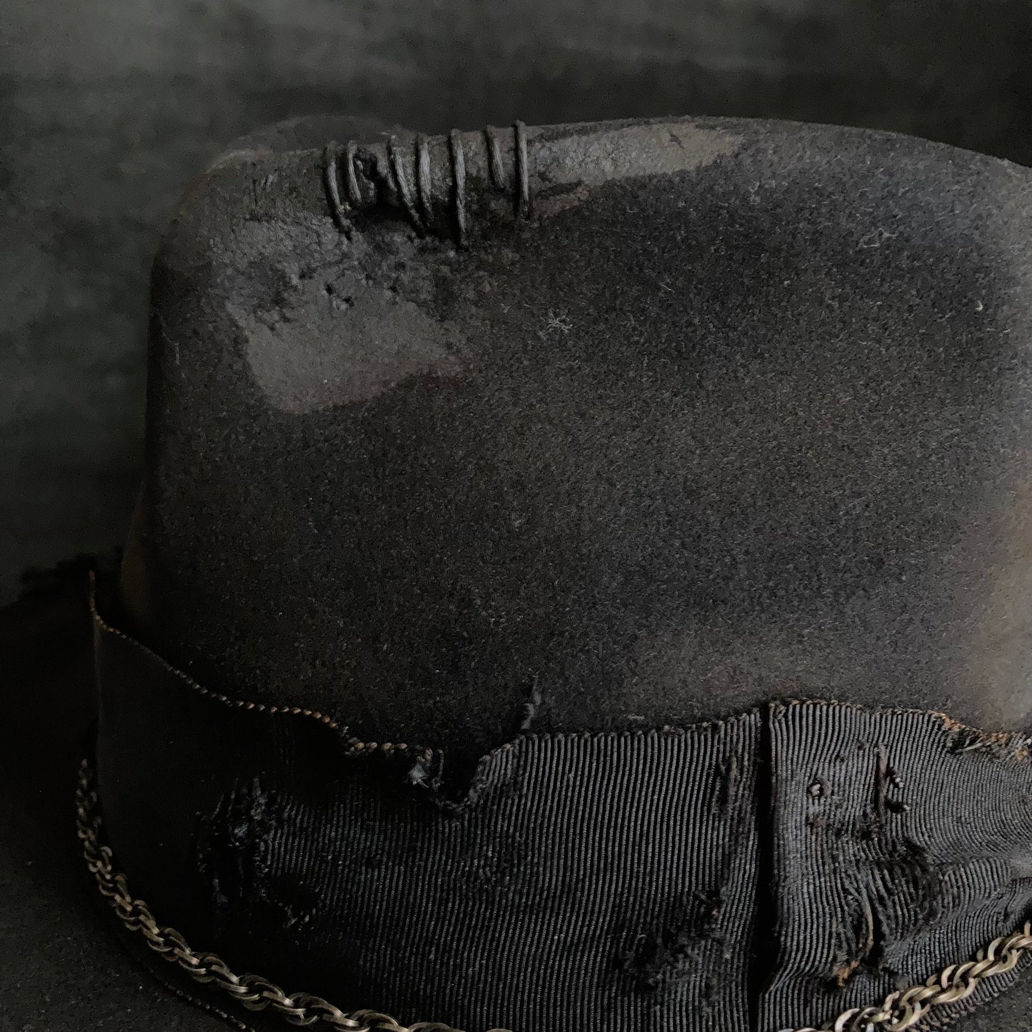 Damaged black rabbit fedora