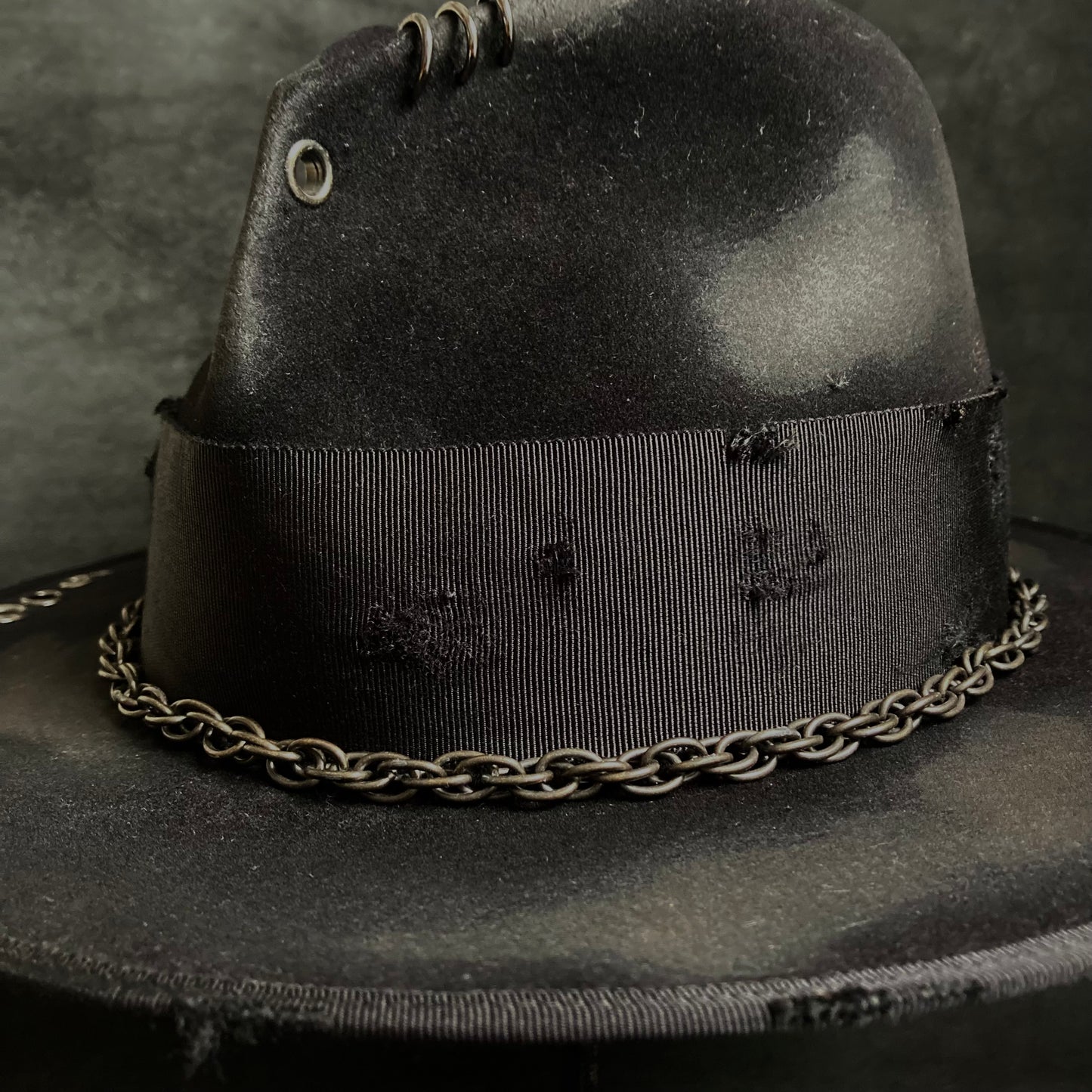 Rebellion eyelet fedora hat