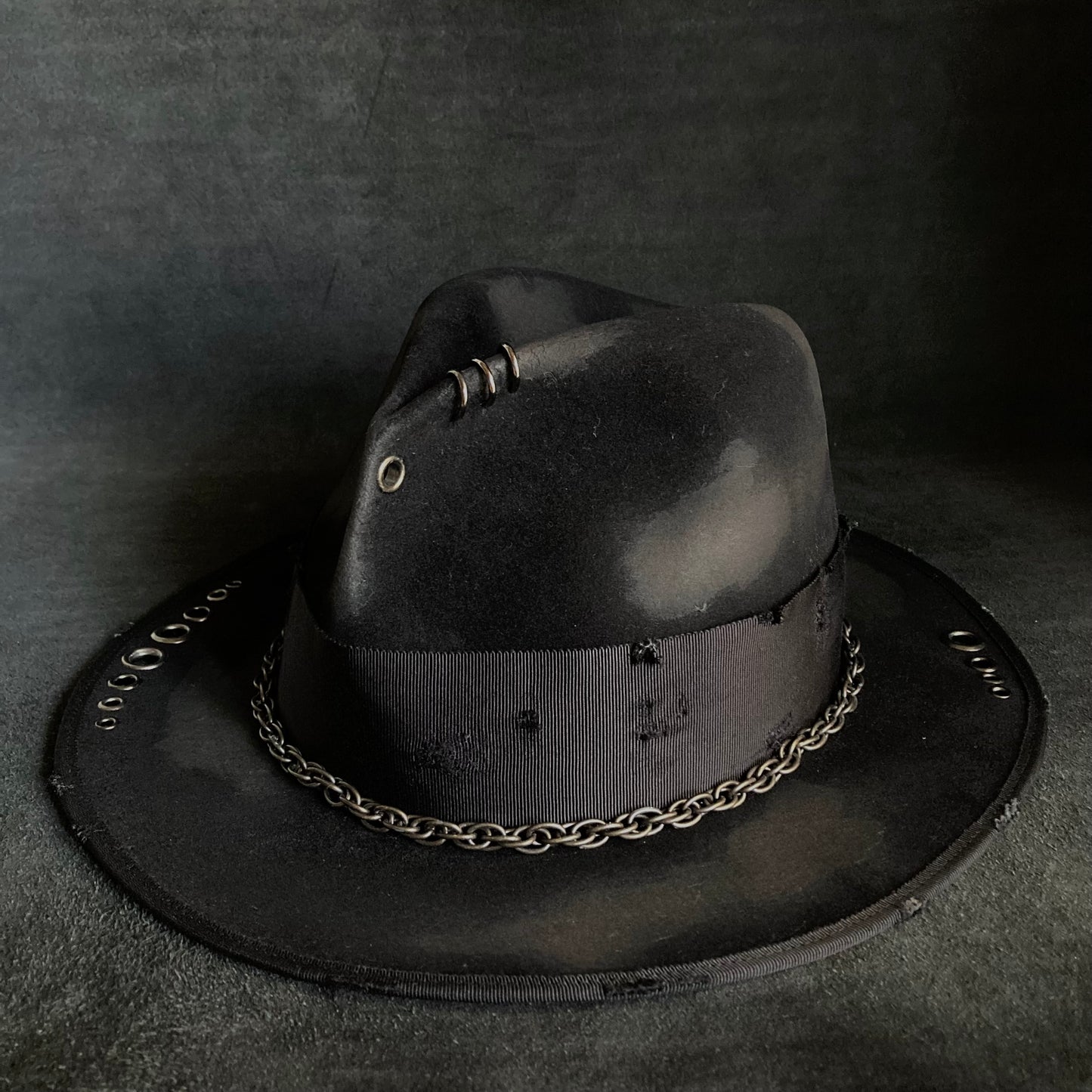 Rebellion eyelet fedora hat