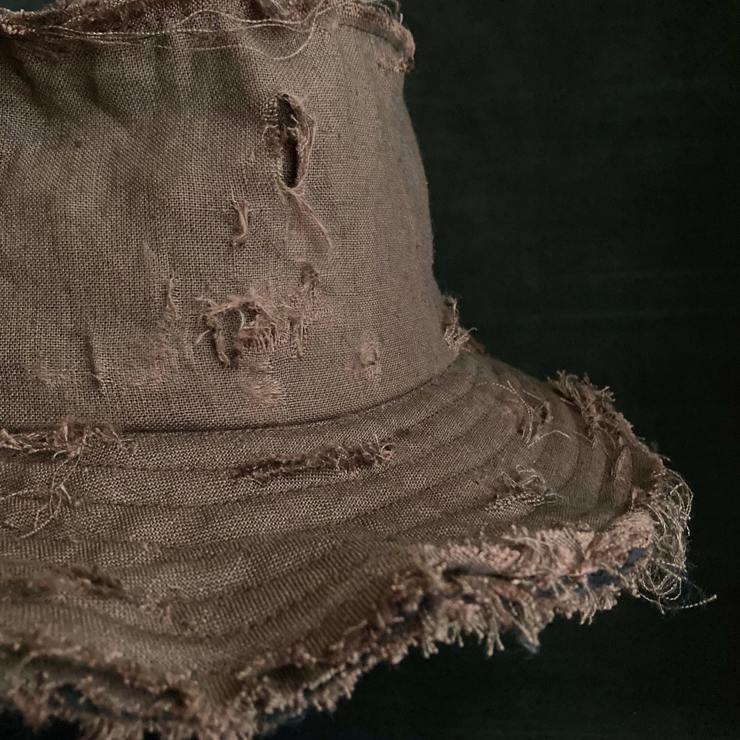 Back side brown linen damage bucket hat