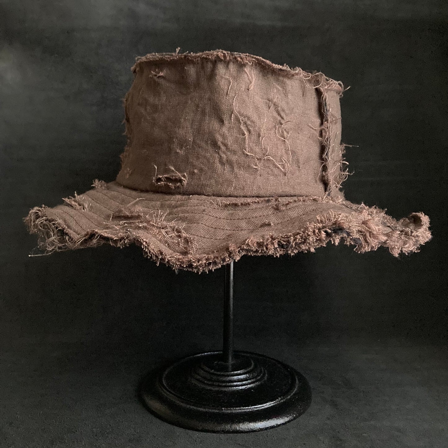 Back side brown linen damage bucket hat