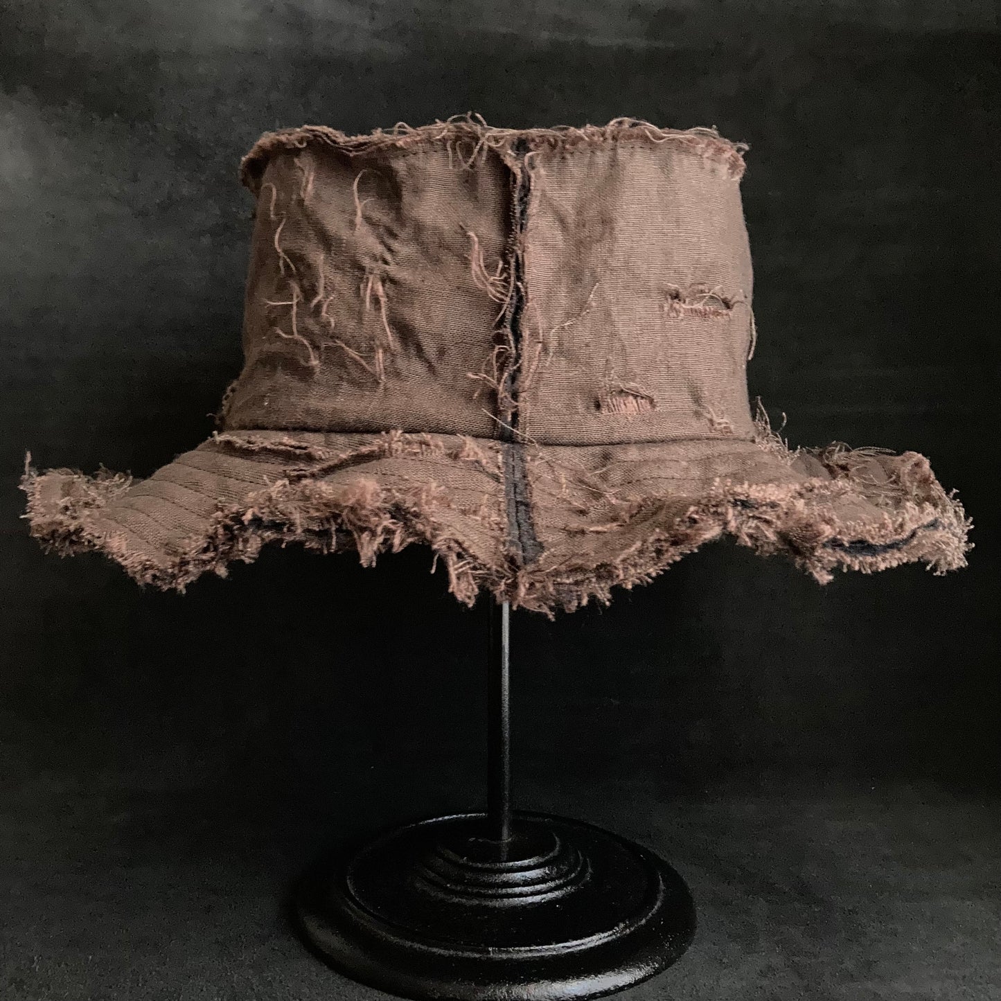 Back side brown linen damage bucket hat