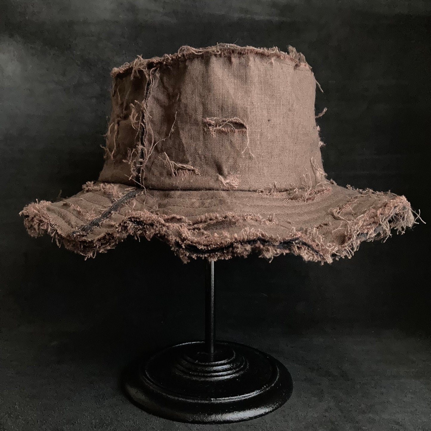 Back side brown linen damage bucket hat