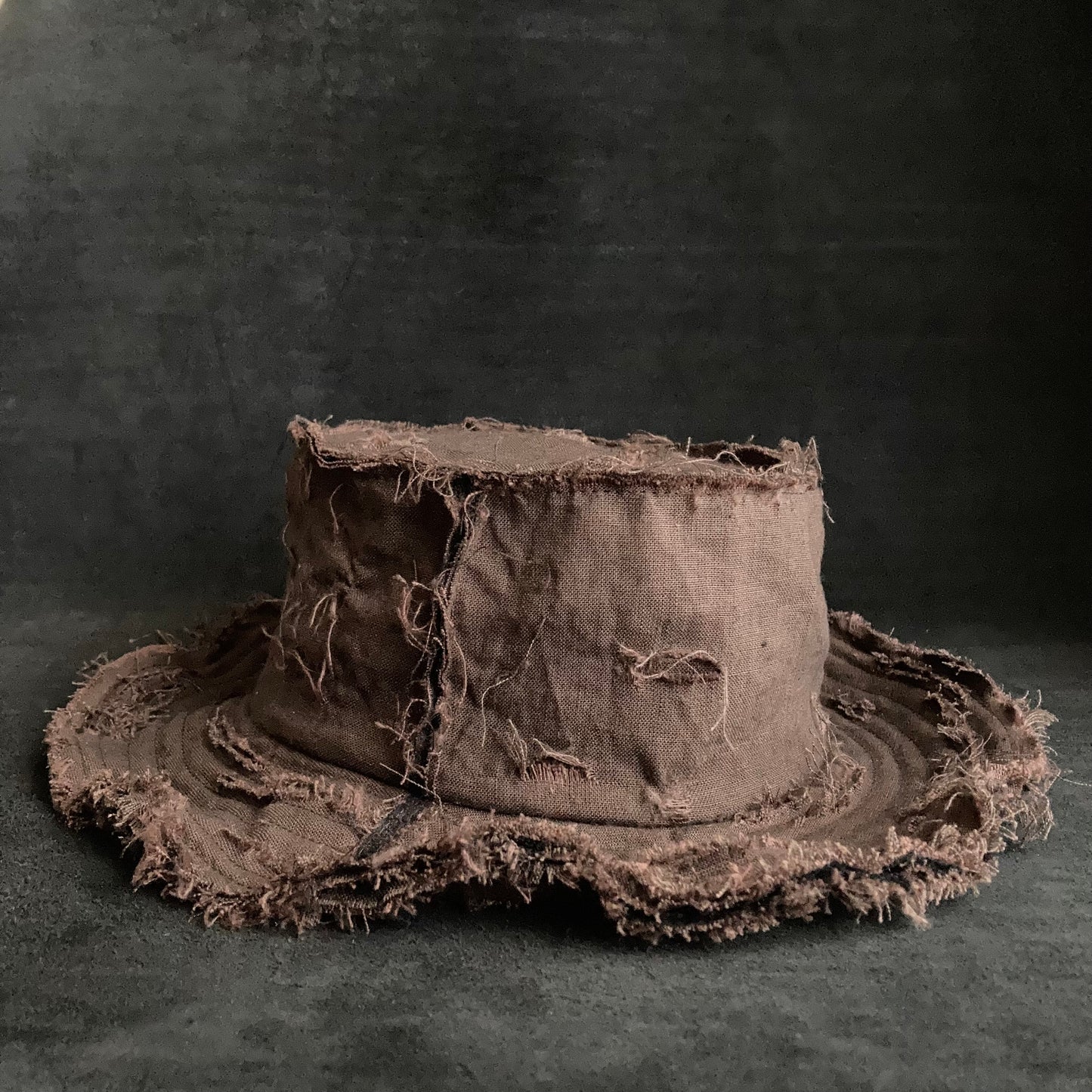 Back side brown linen damage bucket hat