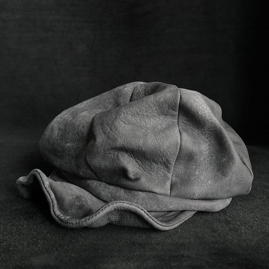 Uneven dyeing spread gray leather casquette