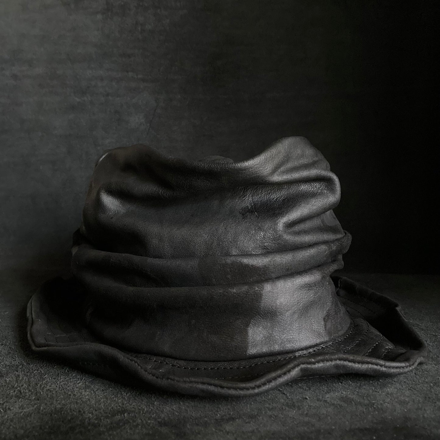 Bleached black leather turn bucket hat