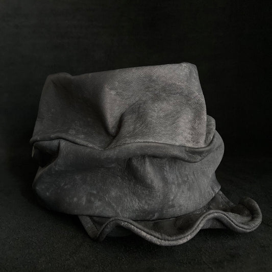 Uneven dyeing spread gray leather turn cap