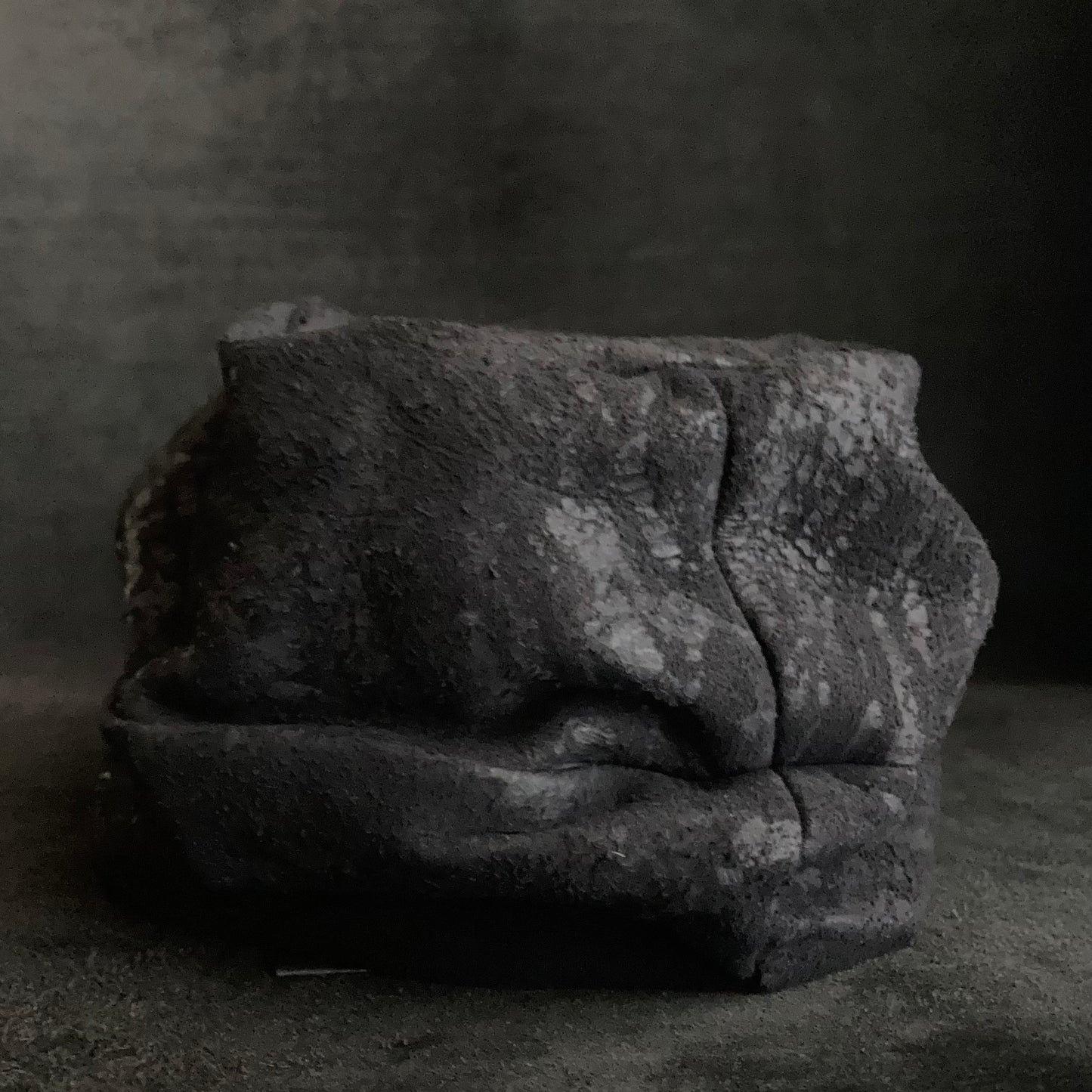 Scrape black leather turn cap