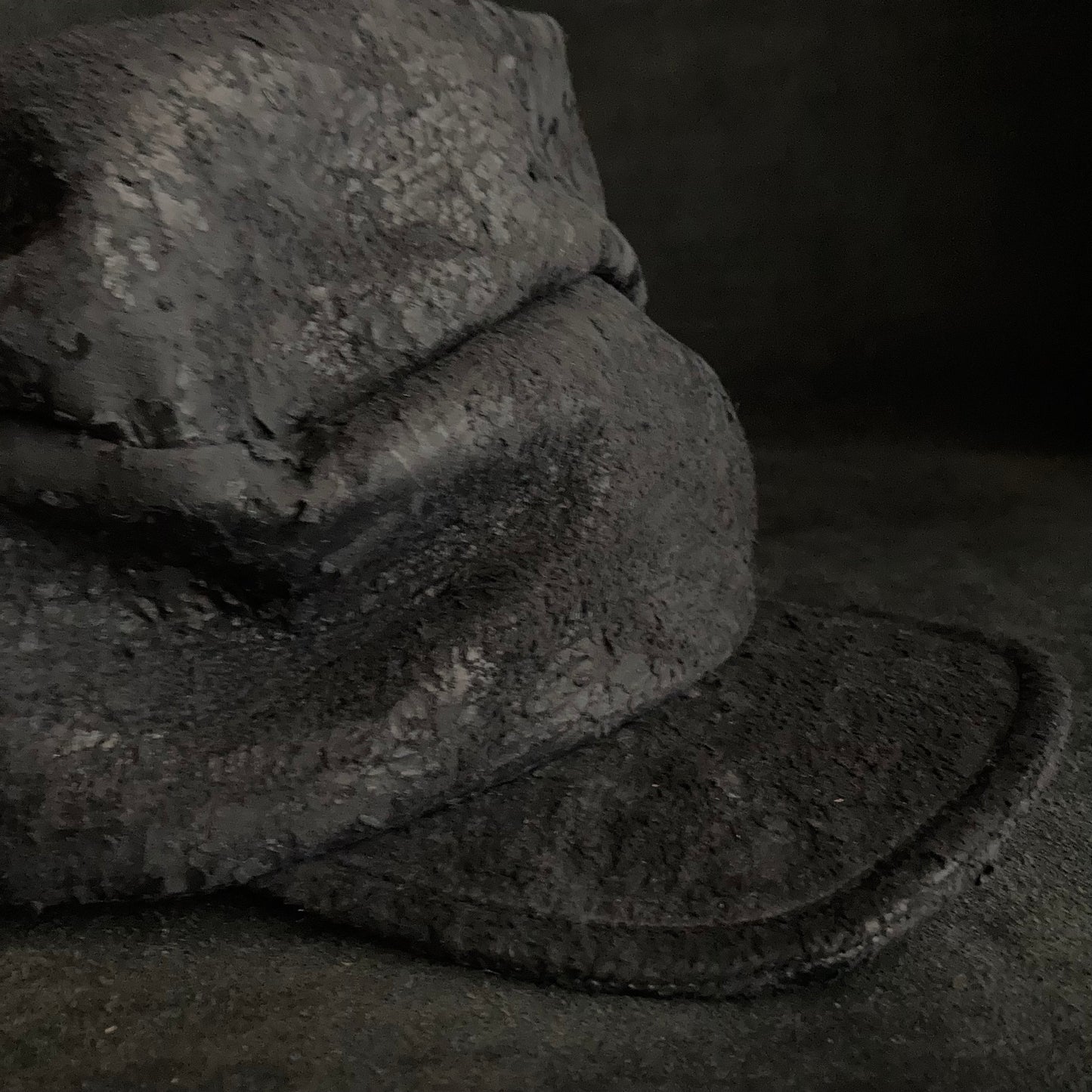 Scrape black leather turn cap