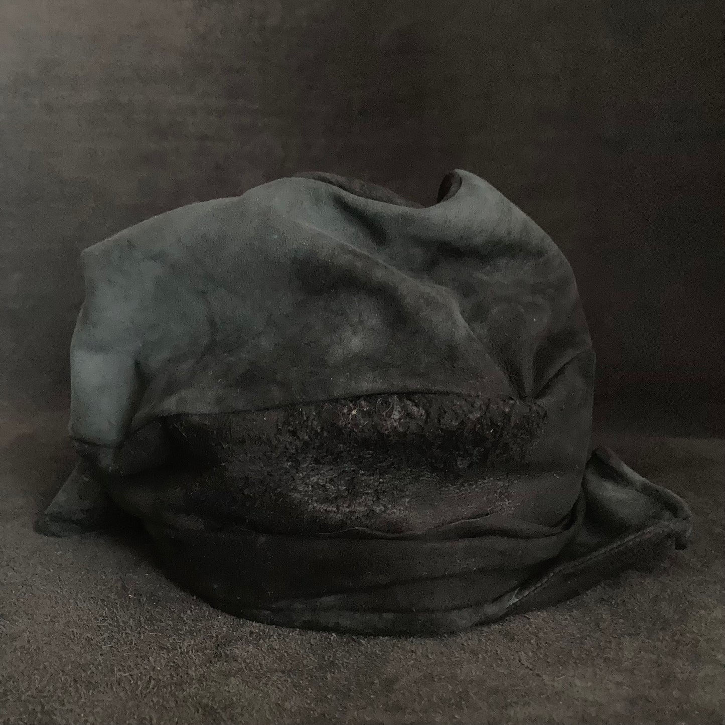 Lake black leather martial turn cap