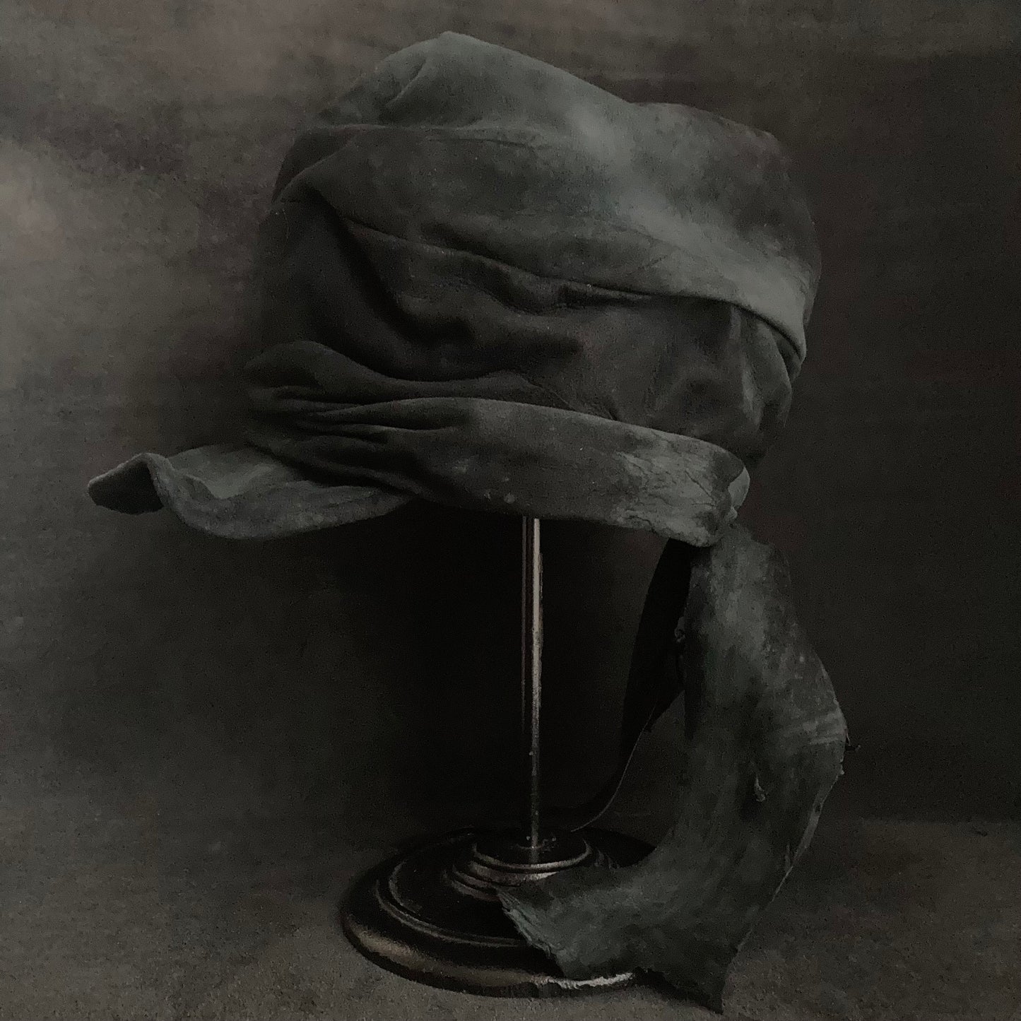 Lake black leather martial turn cap