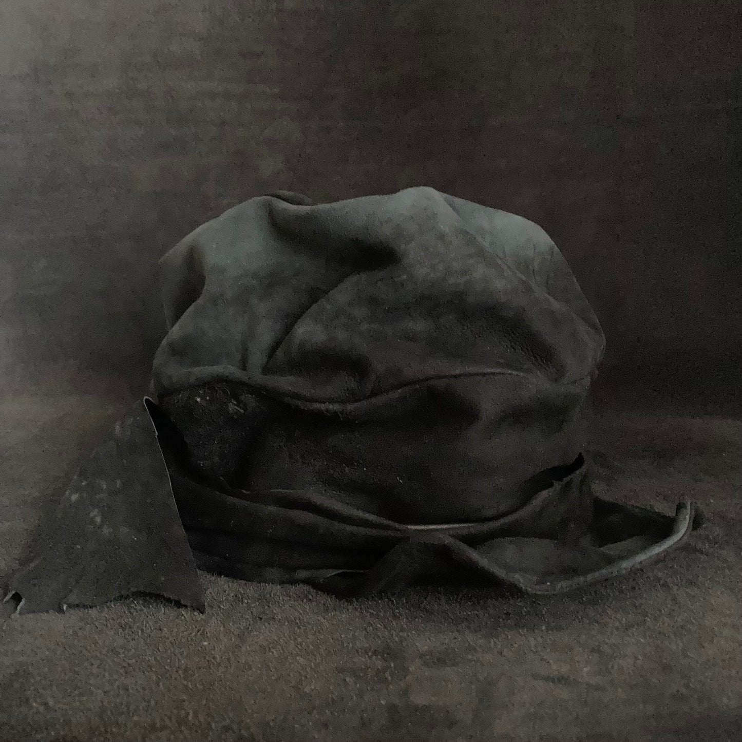 Lake black leather martial turn cap