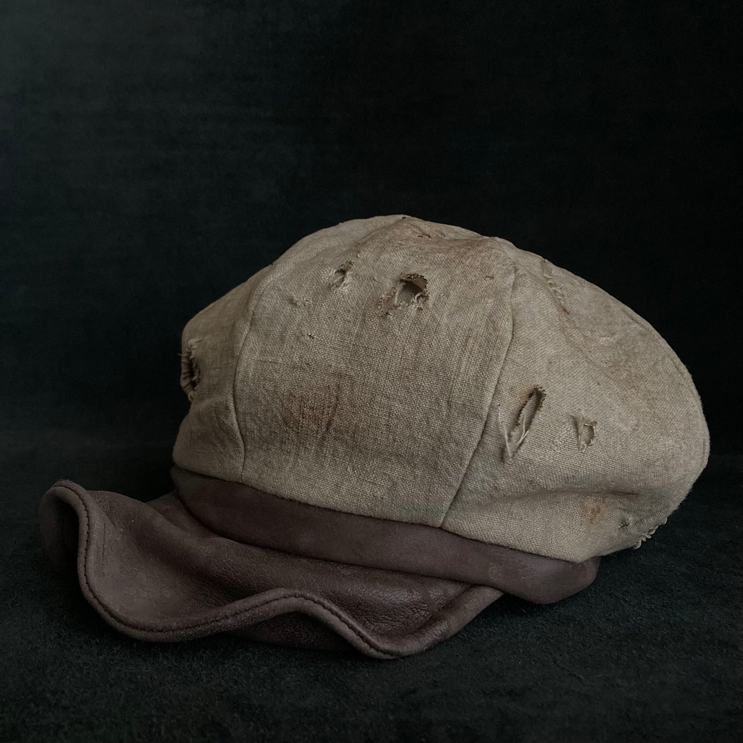 Sand tatters damage linen casquette