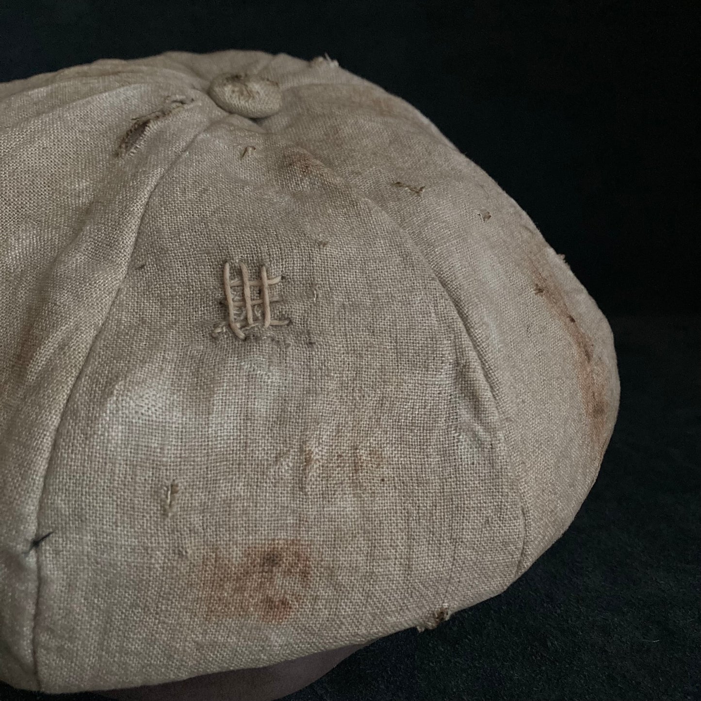 Sand tatters damage linen casquette